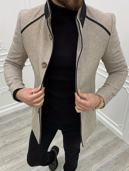 Abrigo entallado para hombre de longitud media con espiga y ribetes en contraste, chaqueta con cuello alto elegantemente confeccionada para otoño e invierno.